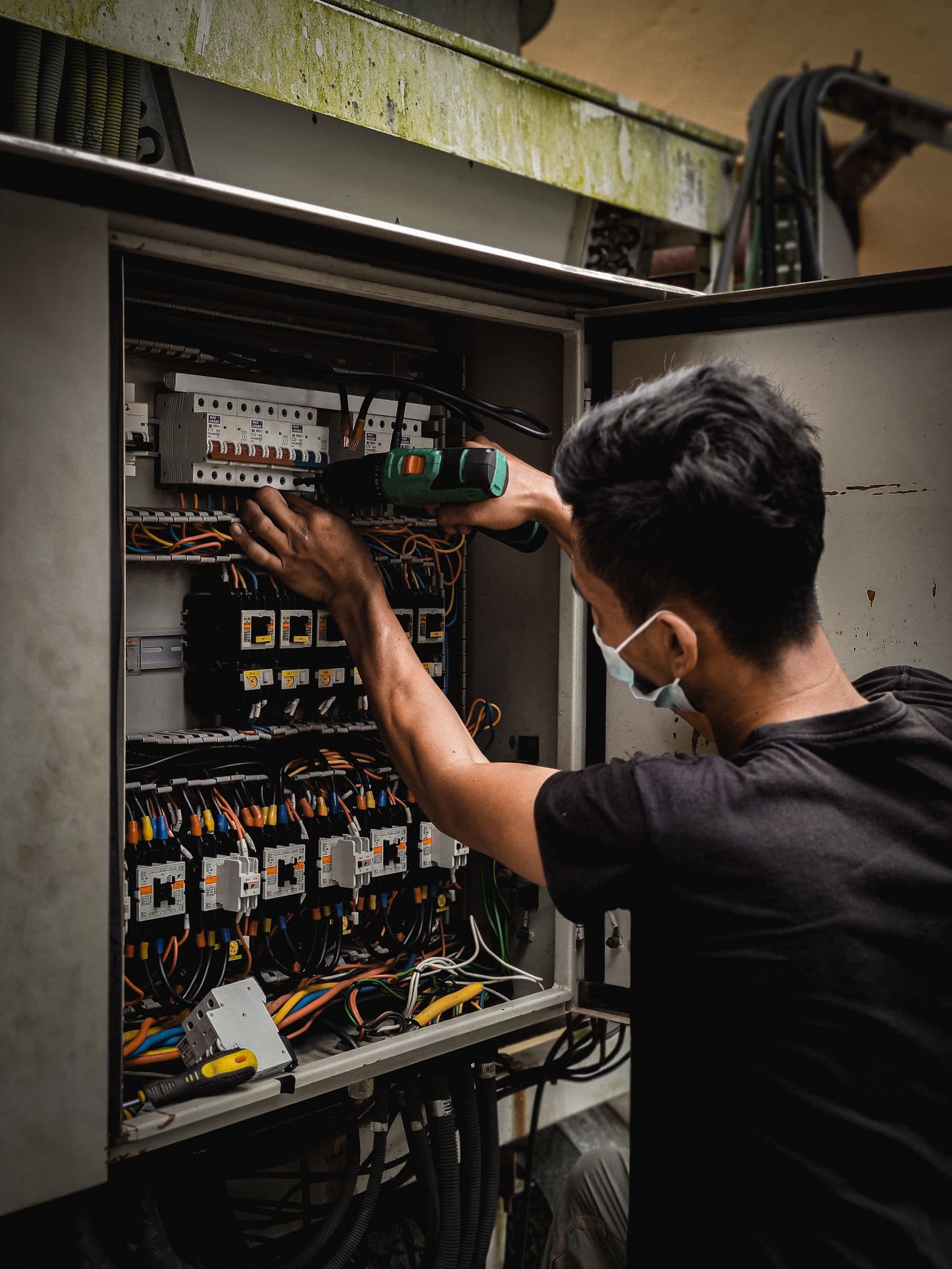 Open electrical panel with labeled breakers
